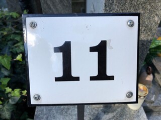 Classy metal sign that says number 11