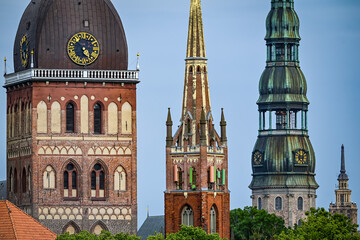 Fototapeta premium Old Riga towers and clocks in Latvia