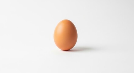 Fototapeta premium Simple Brown Egg on White Background Represents Healthy Eating Nutritious Meal and Organic Food