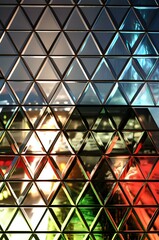 Reflections in a Geometric Kaleidoscope: A Symphony of Colors and Triangular Forms.