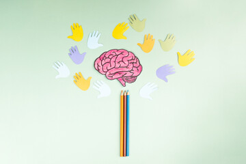 Back to school, colorful pencils, children hands and brain building a tree, education and skill learning, growth of knowledge