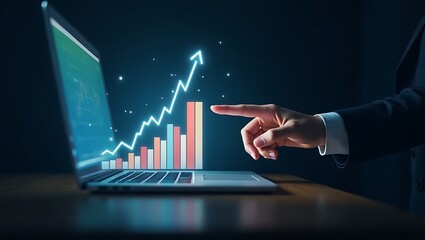 Laptop with rising stock chart hologram emerging, hand gesture interaction.