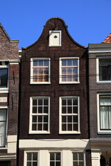 Rozengracht Dark Brown House Facade with Bell Gable in Amserdam, Netherlands
