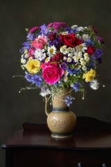Still life with mixed bouquet of flowers