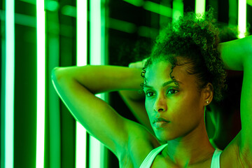 Woman surrounded by laser lights