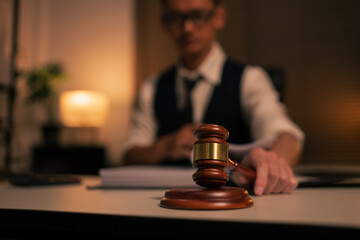 Lawyers are sitting in a meeting, searching for legal documents at the office.