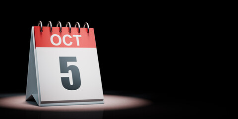 October 5 Calendar Spotlighted on Black Background