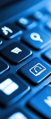 Close-Up of Modern Keyboard Keys in Blue Lighting Setting