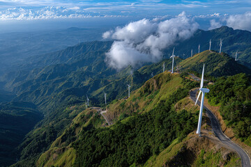 Wind turbines capture energy on sunny mountain slopes