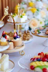 Assorted delicious desserts and cakes exquisitely arranged on table, close-up, festive celebration, buffet