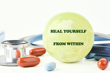 The concept phrase HEAL YOURSELF FROM WITHIN. Heal yourself, mental health, absent-minded, feeling...