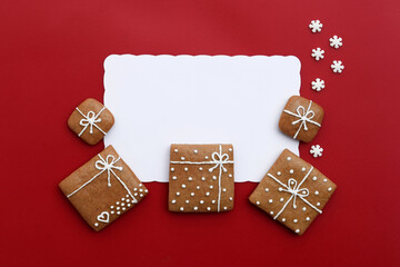 Decorated gingerbread cookies - christmas presents with small sugar snowflakes, white space for text