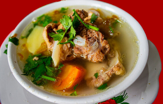 sop buntut or oxtail soup or tail soup is traditional soup made from tail ox, Boiled with Spices