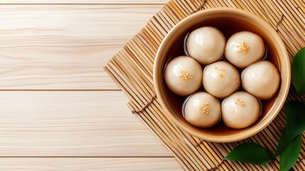 A beautifully arranged bowl of glutinous rice balls in a sweet syrup showcases a traditional dessert, symbolizing family gatherings and festive celebrations, capturing cultural essence.