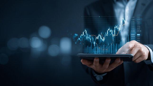 Businessman holding digital tablet with financial graphs and stock data overlay, concept of investment, fintech, and market analysis financial technology, stock market, investment