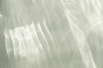 Abstract sunlight shadows background with flare and glare top view. Natural abstract aesthetic mockup with caustic effects for design and presentation.