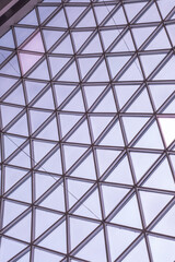 Architectural glass structure with a geometric triangular pattern, Steel glass roof wall construction transparent window with support system