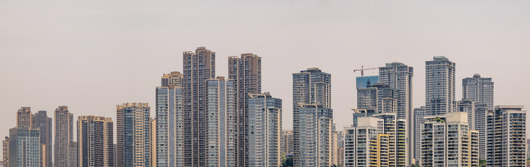 modern apartment building with balconies and laundry drying in Chongqing, China