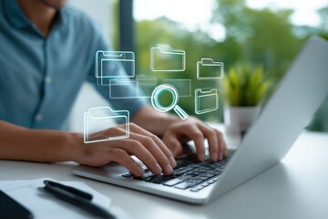 Modern digital document management with futuristic glowing folder icons on a laptop screen in a bright outdoor workspace environment with green trees