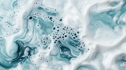 This captivating abstract image explores the dynamic movement of ocean waves, showcasing soft foam patterns and bubbles in vibrant turquoise tones.