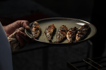 Grilled Sardines are a traditional dish during the Summer Saints Popular Festivals, "São João" and "Santo António", in Braga, Porto, and Lisbon, Portugal.