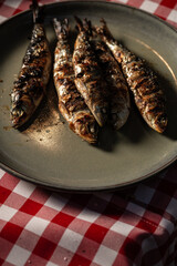 Grilled Sardines are a traditional dish during the Summer Saints Popular Festivals, "São João" and "Santo António", in Braga, Porto, and Lisbon, Portugal.