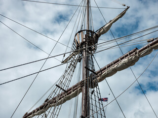 Crows Nest and Rigging of a Traditional Sailing Ship Against Blue Sky
