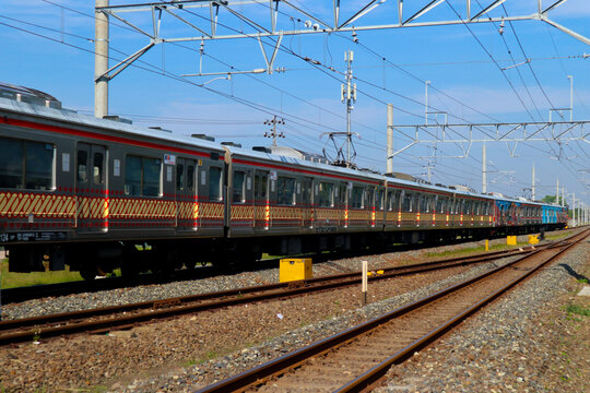 klaten, Indonesia - july 3, 2021: Commuter Line (train) KRL train arrive at klaten, to solo railway station, Klaten, Indonesia