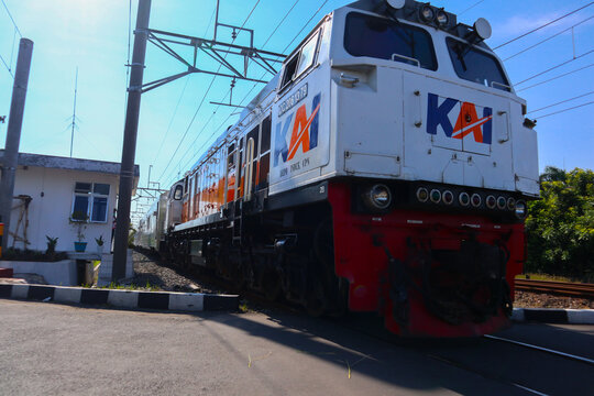 klaten, Indonesia - july 3, 2021: Commuter Line (train) KRL train arrive at klaten, to solo railway station, Klaten, Indonesia