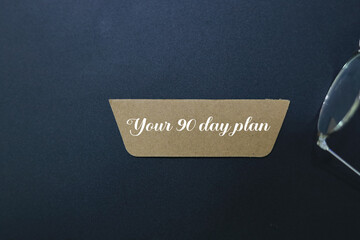 wooden tag with the words Your 90 day plan. In this final step of the framework you'll choose 3...