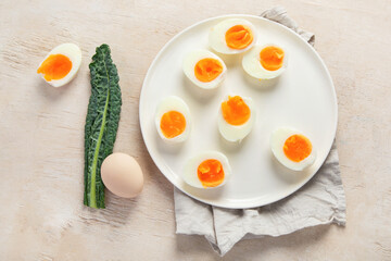 Plate with halves of delicious boiled eggs.