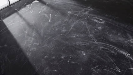 Black and white photo of a bathroom floor