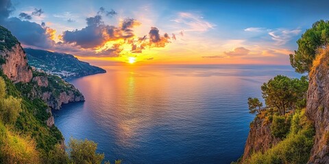 Panoramic sunset over coastal cliffs and sea