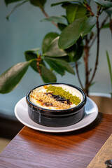 Turkish dessert with milk rice and nuts sprinkled on top of cereals