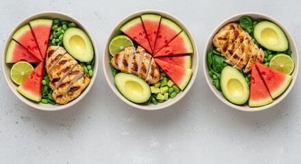 Grilled Chicken Bowls with Fresh Avocado, Watermelon, and Lime Garnish for a Healthy Meal