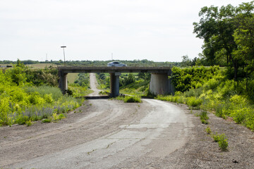 A road with a bridge over it