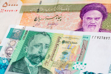 50000 Iranian rial and Bulgarian lev banknotes. International trade concept
