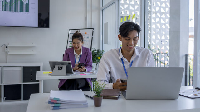 the atmosphere of the company's employees working together, the finance department staff work with the accounting department, a group of businessmen are exchanging insights with each other - Powered by Adobe