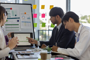 entrepreneurs brainstorm together to develop new products in a conference room, businesspeople...
