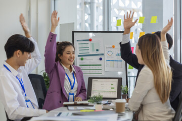 businesspeople show their joy by clapping or expressing their facial expressions by shouting 'yes'...