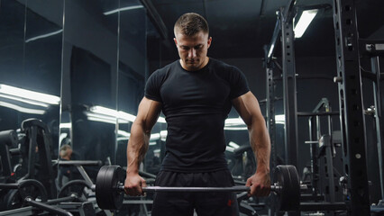 A person training with free weights in a fitness center