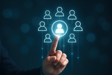 Hand selecting a person icon from a network of connected icons.