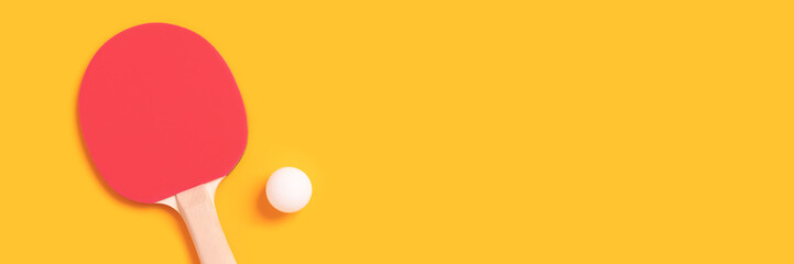 Banner with tennis racket and white ball on a yellow background.