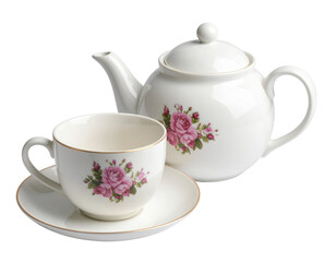 A white porcelain teapot and teacup with matching pink rose floral designs and subtle gold trim.
