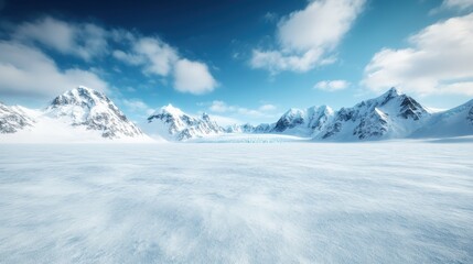 An expansive view of snowy mountains under a bright blue sky, highlighting the stunning beauty of winter landscapes and the vastness of nature&rsquo;s untouched wilderness.