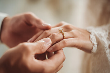 Man give a woman a engagement ring to become husband and wife in a wedding