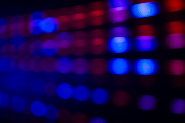 Close up blurred and softy bokeh of blue-red color from LED lighting backdrop. Background for...