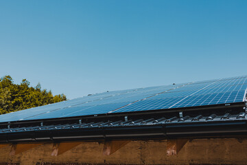 Solar panels converting sunlight into renewable energy on a roof