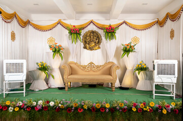 Grand Indian Wedding Stage with Ganesh Idol and Floral Decor
