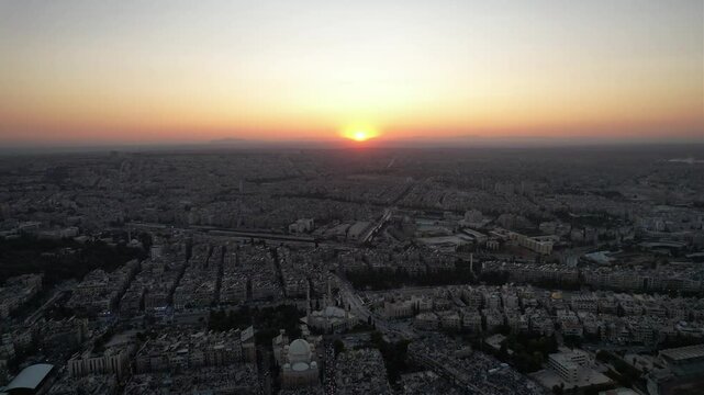 Drone view of a church next to a mosque in Aleppo, symbolizing peaceful coexistence in Syria